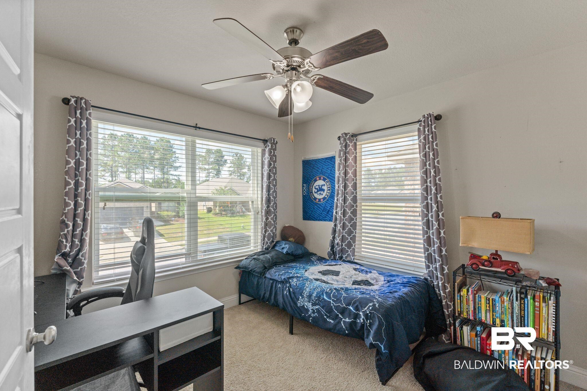 12711 Chickadee Lane Daphne, AL 36527 - Photo 21 of 39 Bedroom featuring light colored carpet, an office area, and a ceiling fan