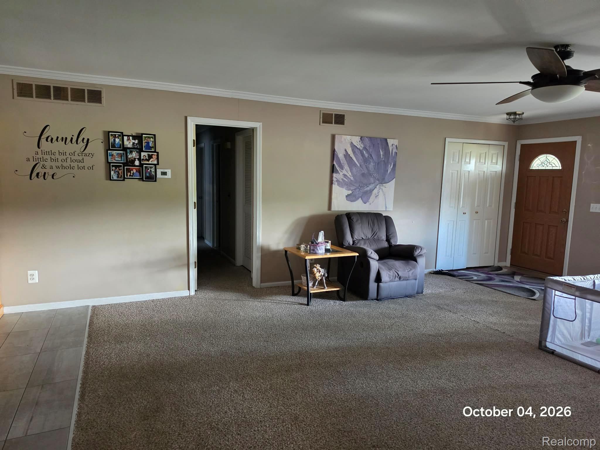 34781 Union Lake Road Clinton Township, MI 48035 - Photo 4 of 38 Carpeted flooring, recessed ceiling vent, crown molding, and a ceiling fan with integrated lighting