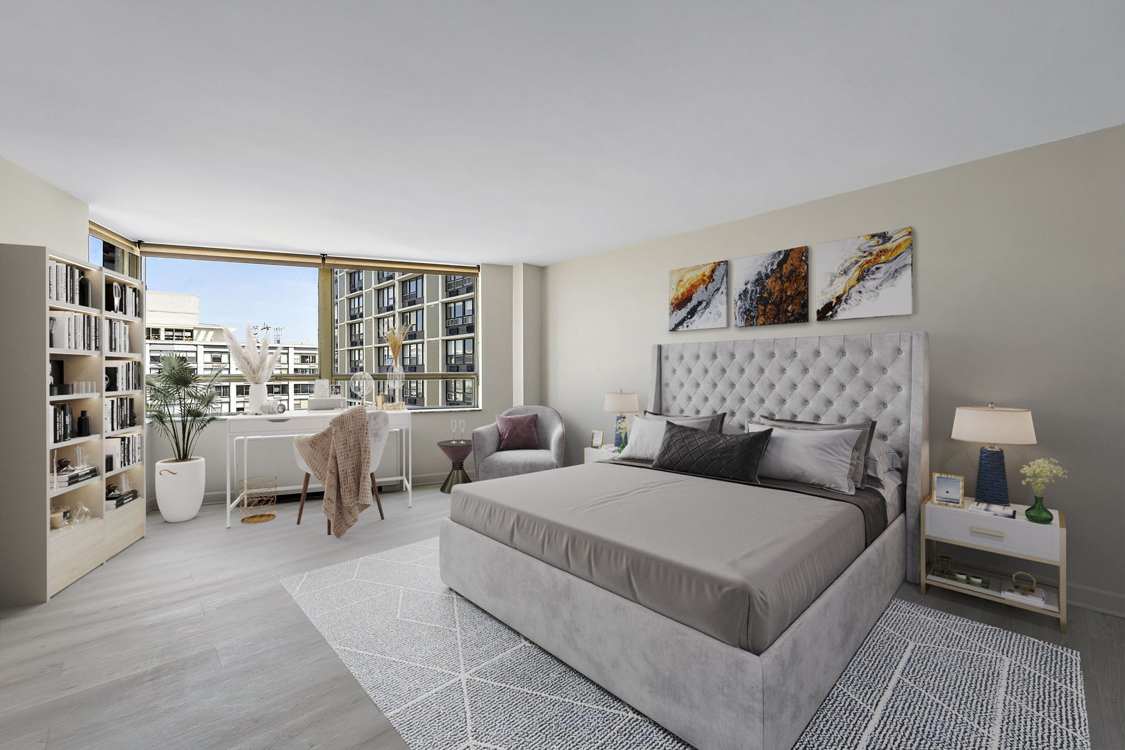5701 North Sheridan Road, Unit 21D Chicago, IL 60660 - Photo 5 of 29 a bedroom with a large bed and a couch