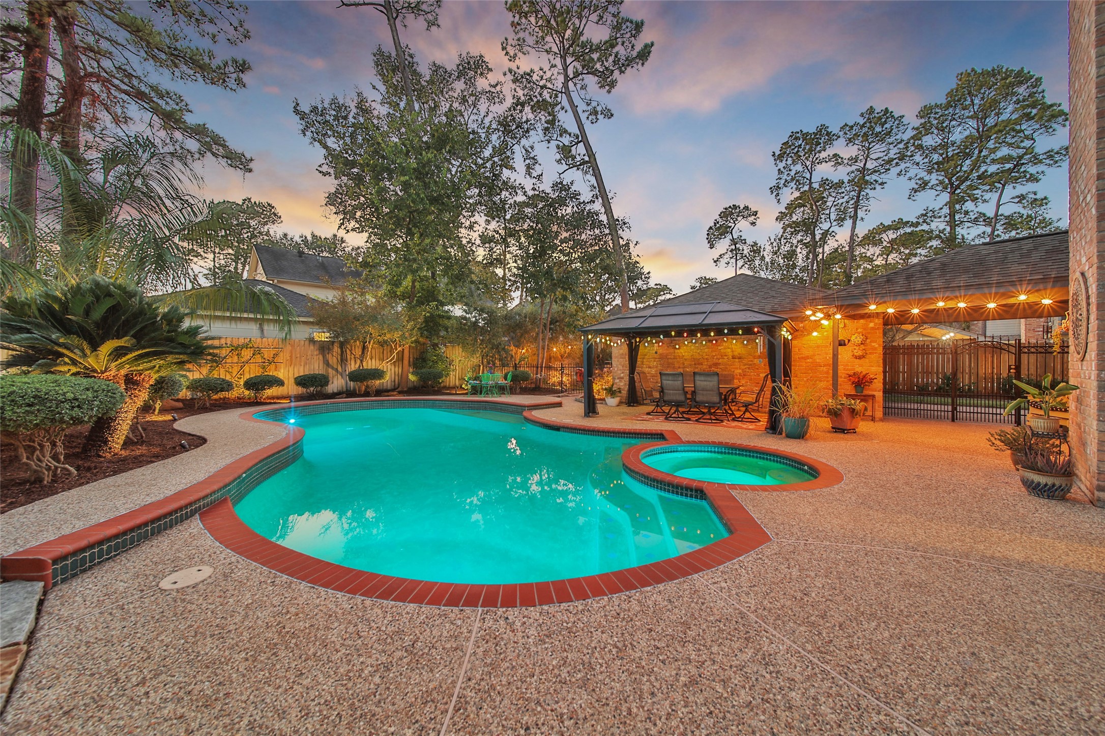 17007 Windrow Drive Spring, TX 77379 - Photo 38 of 46 a view of a swimming pool with an outdoor space and seating area