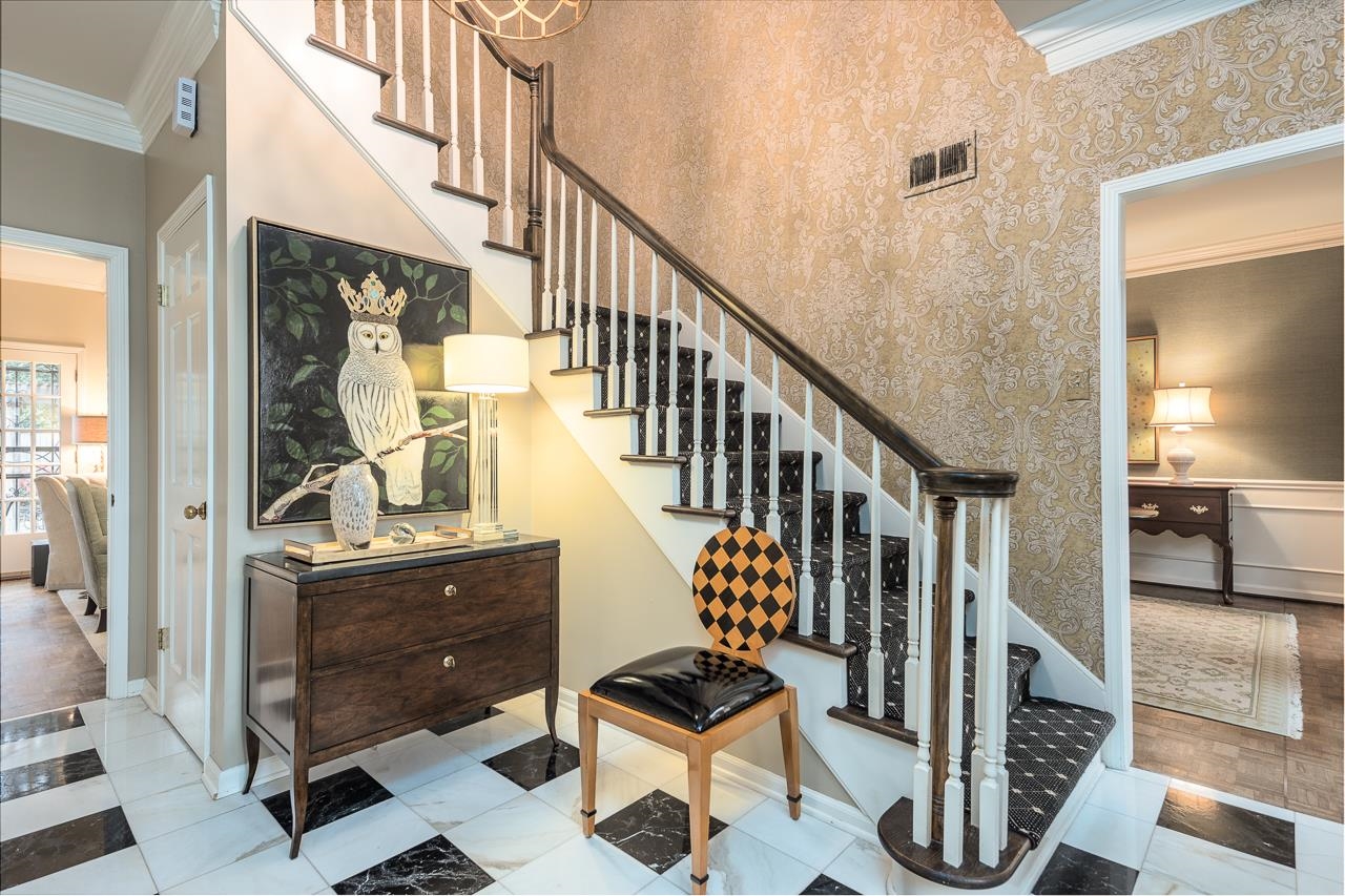 4795 Walnut Grove Road Memphis, TN 38117 - Photo 5 of 40 a view of entryway and hall with wooden floor