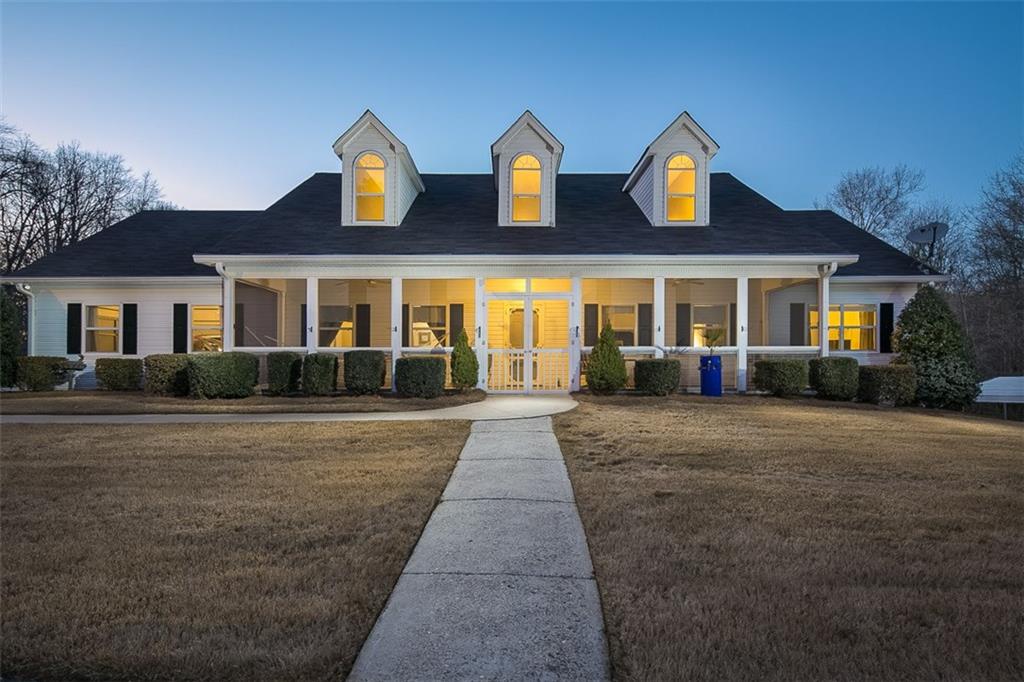 2750 Ike Stone Road Monroe, GA 30656 - Photo 1 of 1 front view of a house with a yard