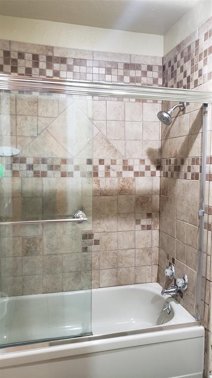 1440 South Keller Road Mineral Wells, TX 76067 - Photo 20 of 24 a bathroom with a shower