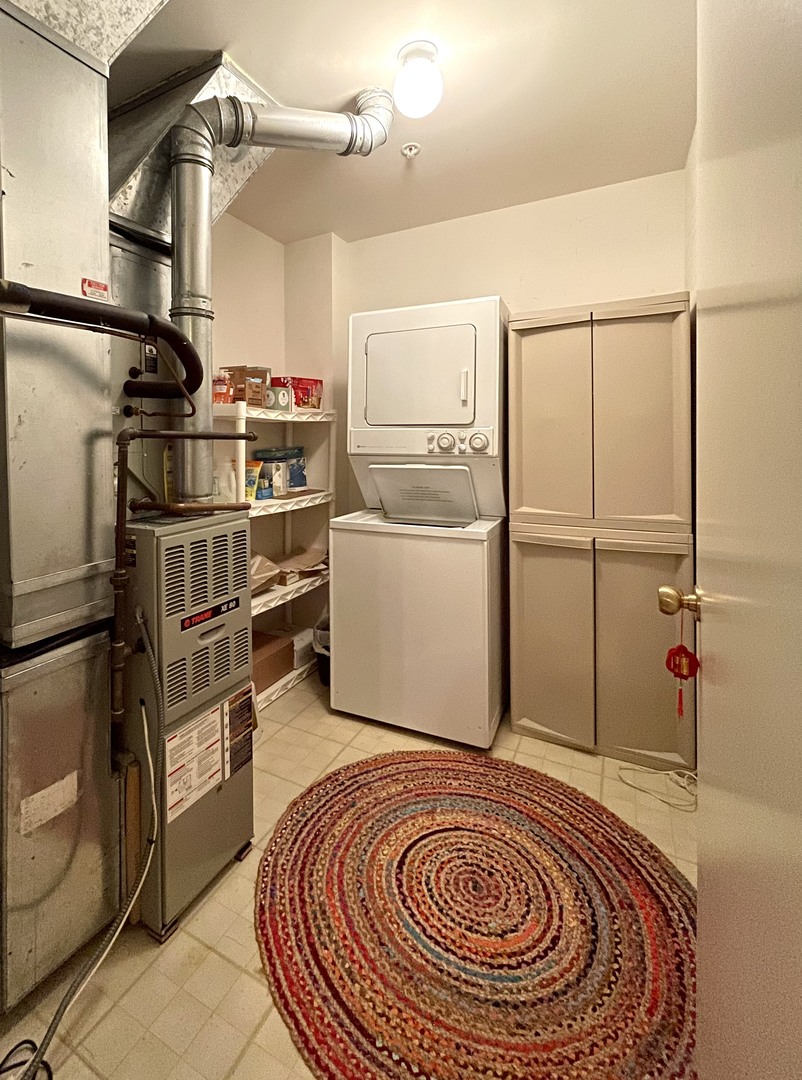 Undisclosed Address Chicago, IL 60604 - Photo 14 of 14 a room with storage and utility