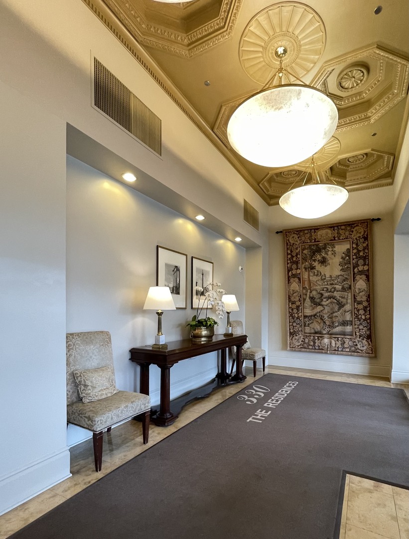 Undisclosed Address Chicago, IL 60604 - Photo 2 of 14 a view of a room with a table and chairs