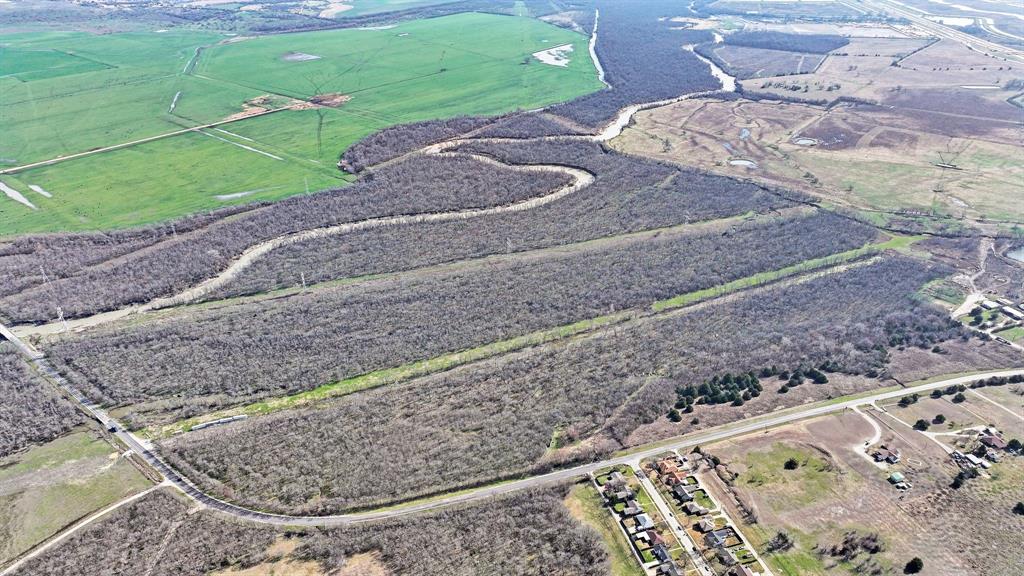 850 East Malloy Bridge Road Seagoville, TX 75159 - Photo 12 of 13 a view of a backyard with wooden fence