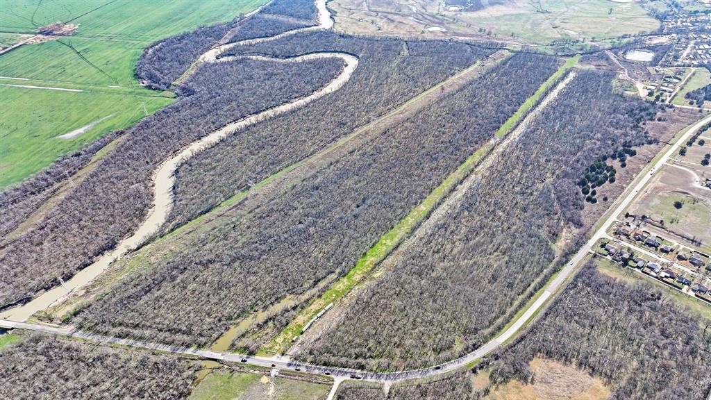 850 East Malloy Bridge Road Seagoville, TX 75159 - Photo 4 of 13 a view of a yard with a wooden fence