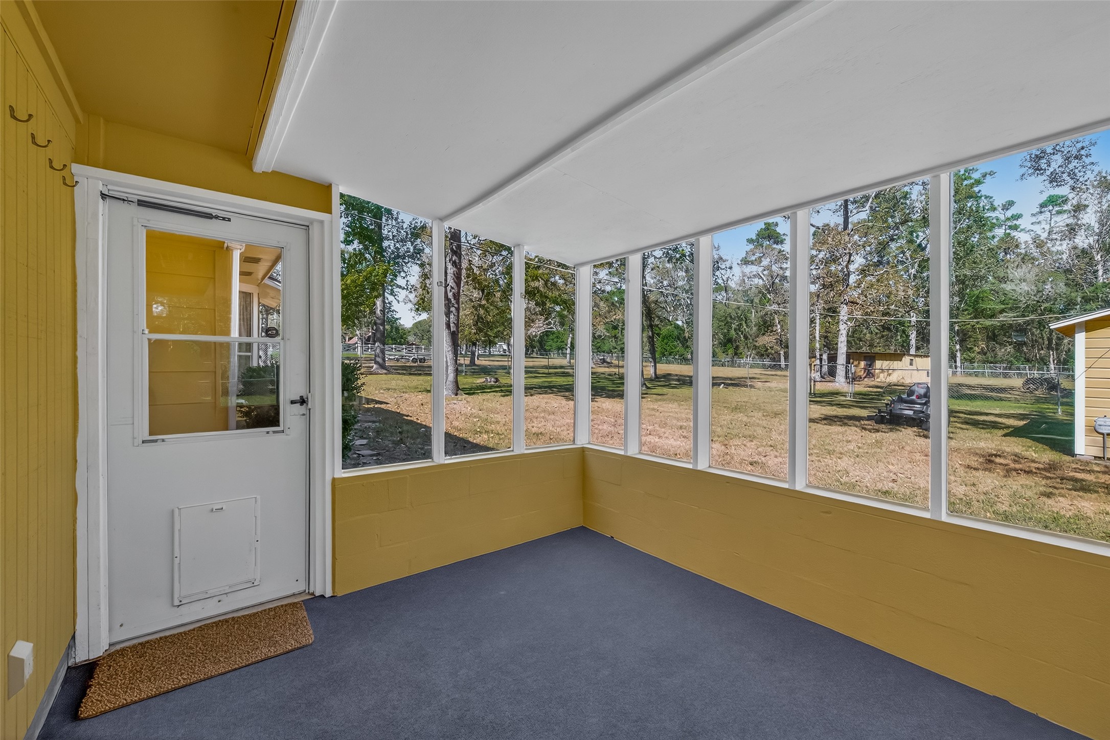 11535 Willis Waukegan Road Conroe, TX 77303 - Photo 38 of 47 a view of an empty room with a large window