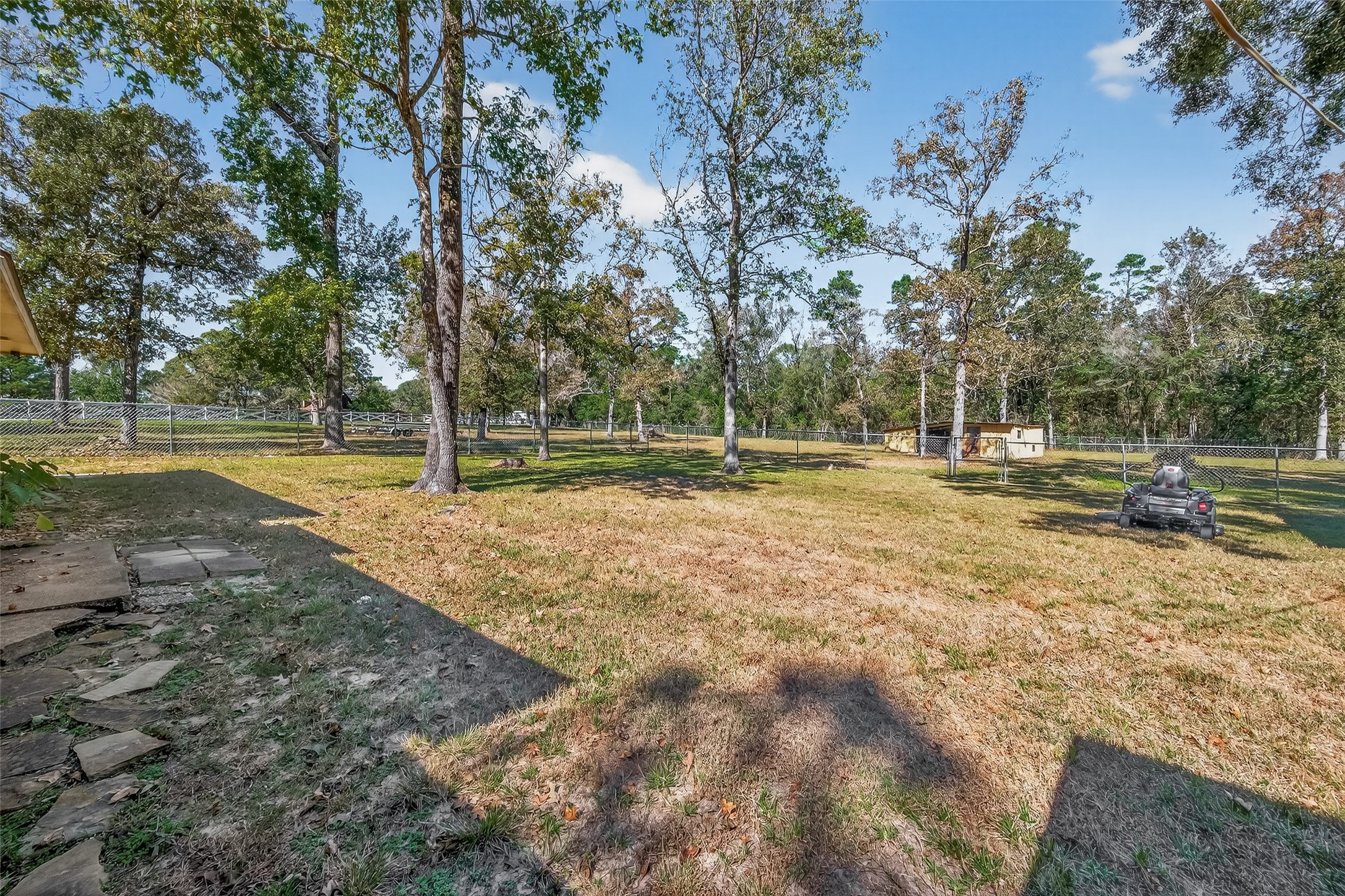 11535 Willis Waukegan Road Conroe, TX 77303 - Photo 40 of 47 a view of outdoor space with deck and trees