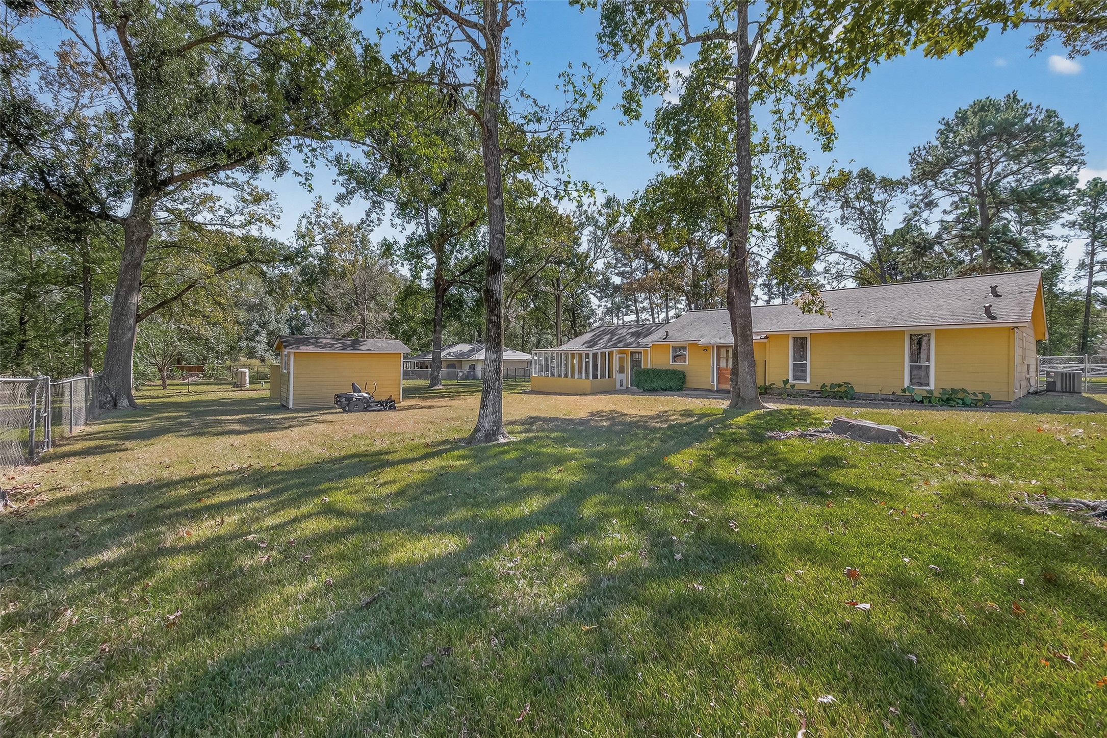 11535 Willis Waukegan Road Conroe, TX 77303 - Photo 41 of 47 a house view with a garden space