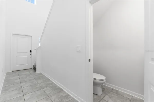a view of kitchen with furniture and window