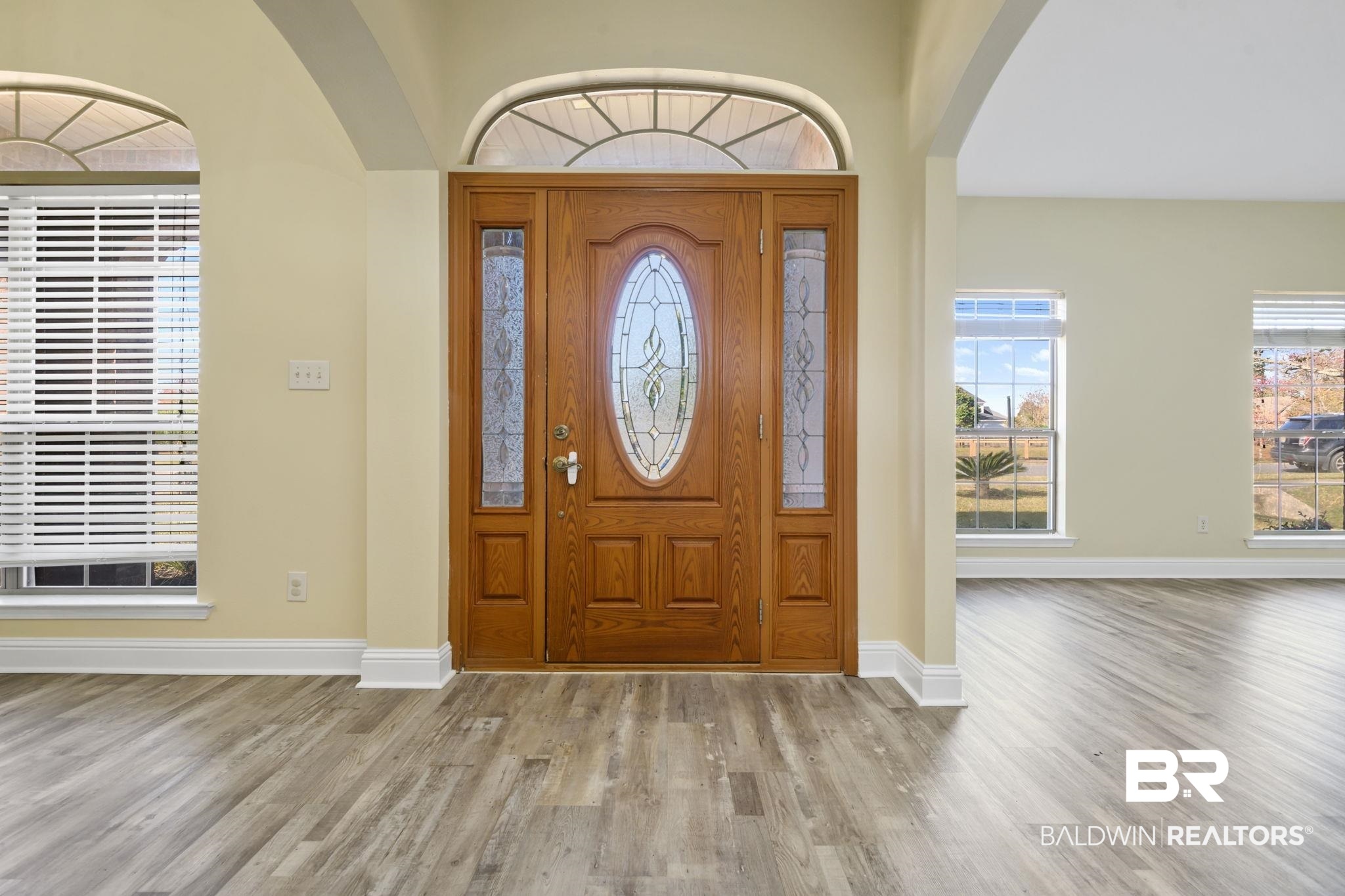 25234 Fairfax Road Daphne, AL 36526 - Photo 8 of 45 Entrance foyer featuring arched walkways and wood finished floors