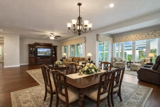 a view of an empty room with cabinet and a bathroom