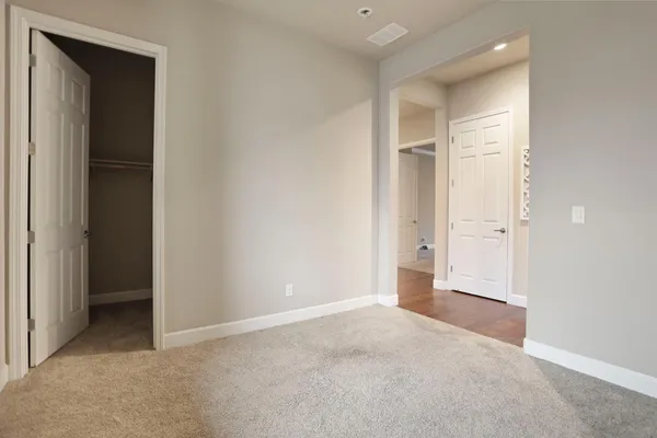 a view of an empty walk in closet
