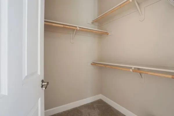 a view of a patio with table and chairs and potted plants