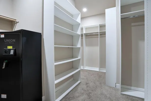 a living room with furniture a table and a large window