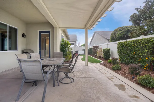 an aerial view of a house with a lake view