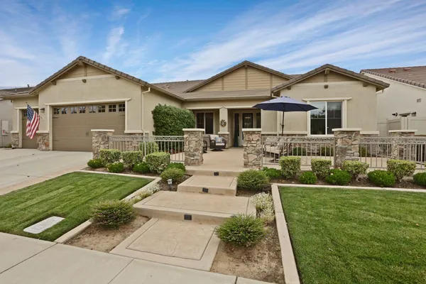 a bathroom with a bathtub and a window
