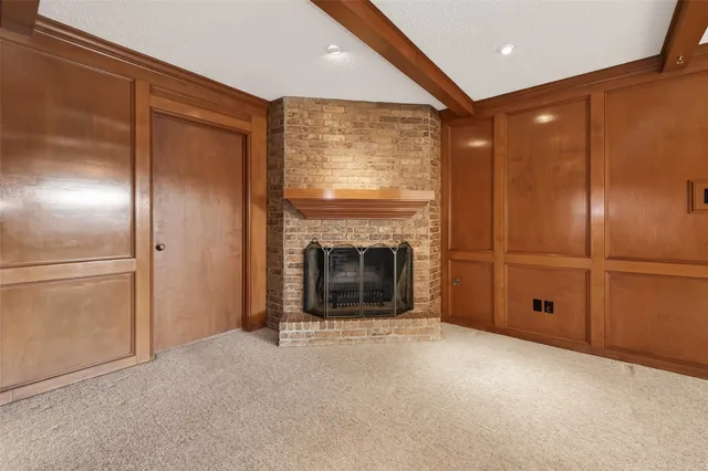 a view of a livingroom with a fireplace