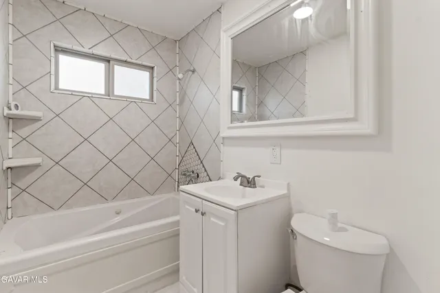 a bathroom with a sink and a toilet