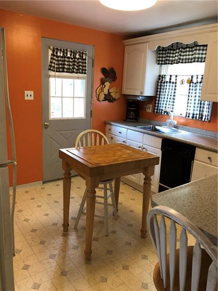 1021 Hamil Road Verona, PA 15147 - Photo 7 of 21 KITCHEN WITH ACCESS TO DECK....