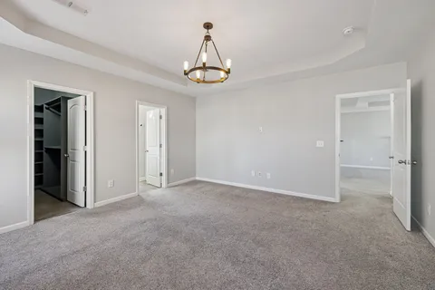 a bathroom with a double vanity sink toilet and a mirror