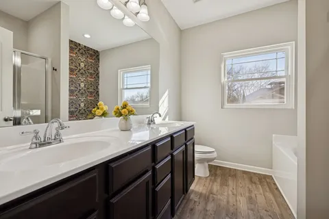 a view of an empty room with closet area