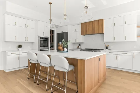 a view of a livingroom with furniture and a table