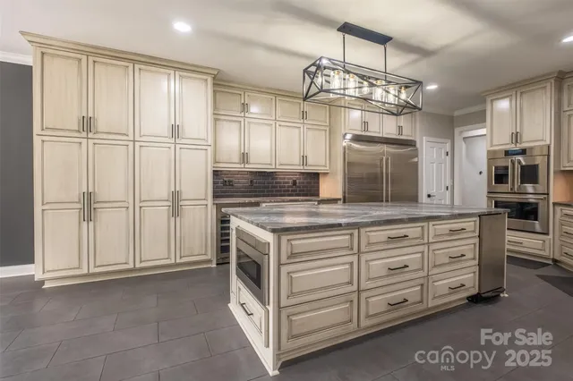 a view of a hallway with wooden floor and closet
