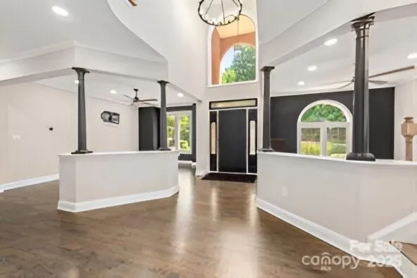 a view of entryway with wooden floor