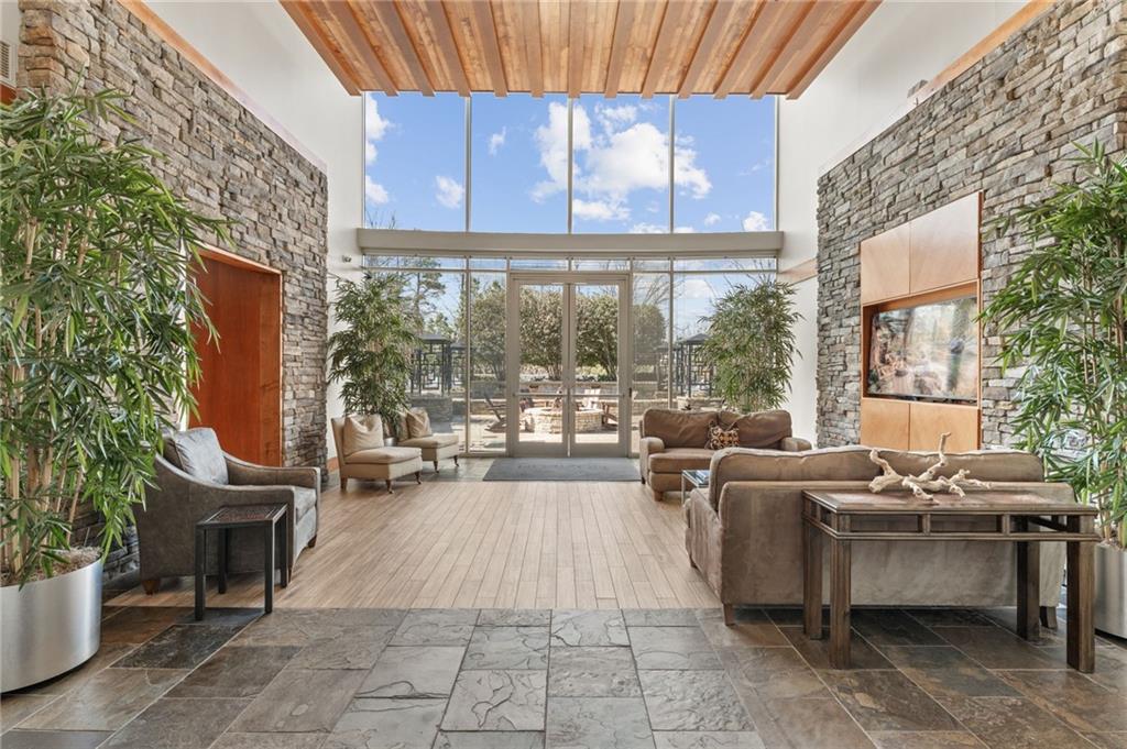 3300 Windy Ridge Parkway Southeast, Unit 809 Atlanta, GA 30339 - Photo 17 of 30 a lobby with furniture and outdoor space
