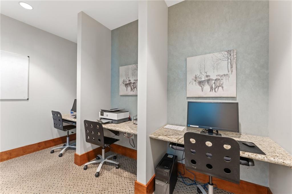 3300 Windy Ridge Parkway Southeast, Unit 809 Atlanta, GA 30339 - Photo 21 of 30 a view of a workspace with furniture