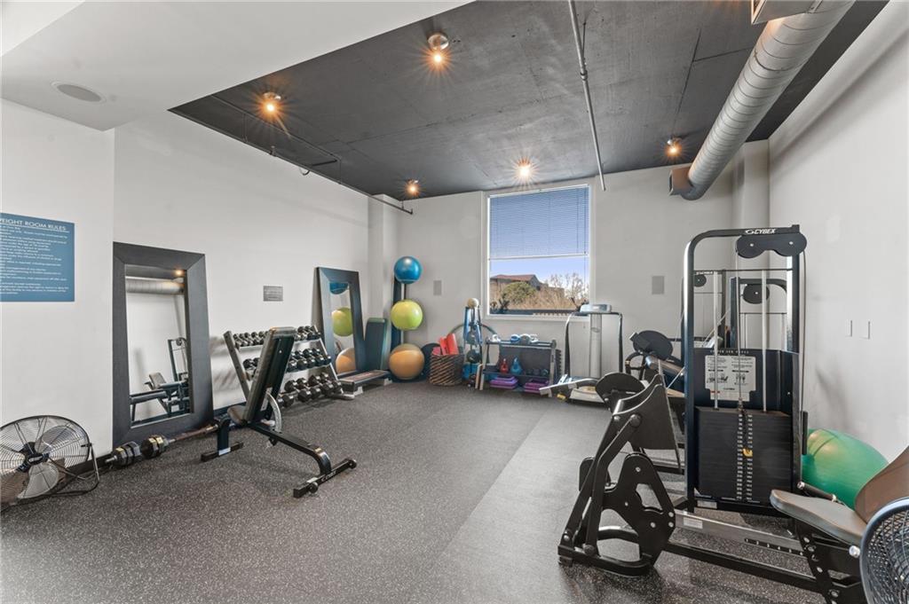3300 Windy Ridge Parkway Southeast, Unit 809 Atlanta, GA 30339 - Photo 24 of 30 a view of a room with gym equipment