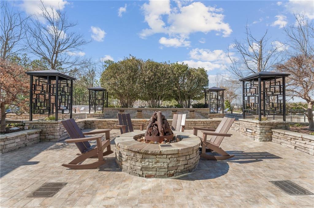 3300 Windy Ridge Parkway Southeast, Unit 809 Atlanta, GA 30339 - Photo 25 of 30 a view of a swimming pool with a patio