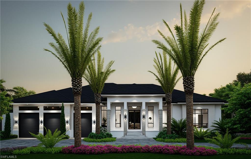 a front view of a house with a garden