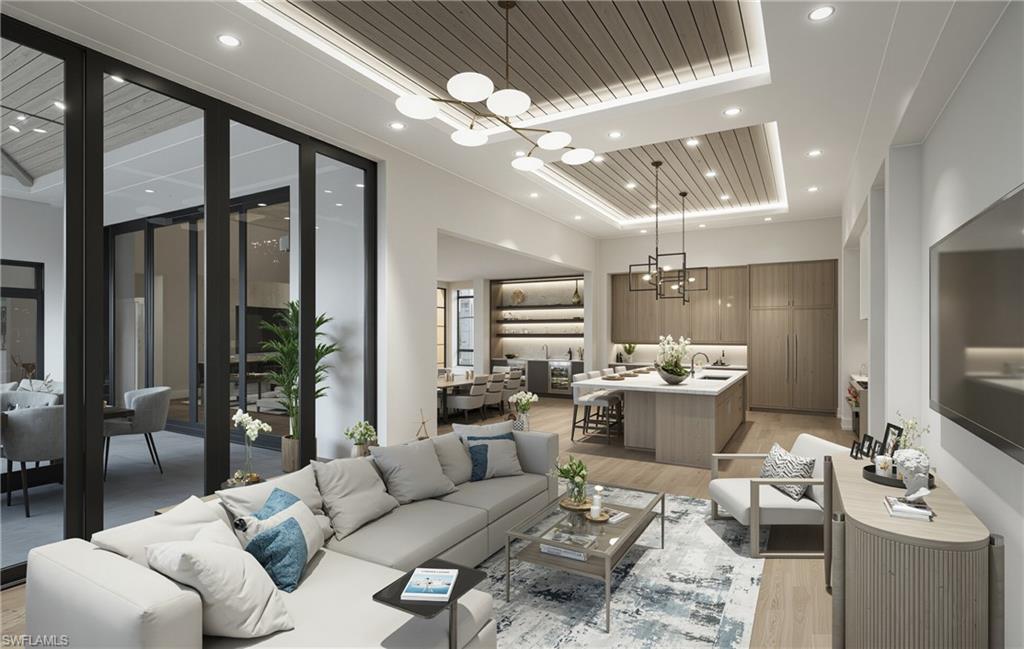 444 Orchid Drive Naples, FL 34102 - Photo 7 of 24 a living room with furniture and a large window