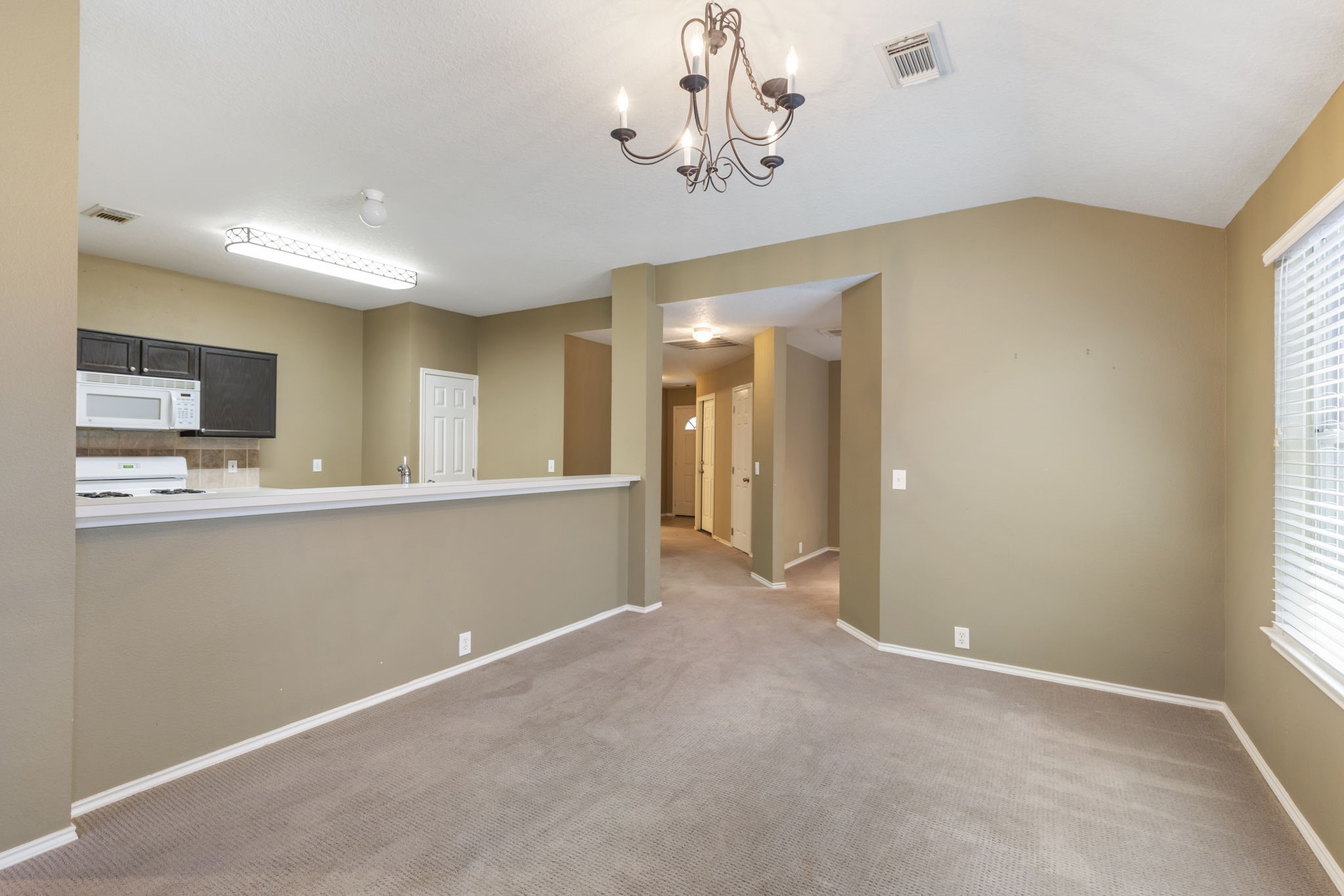 4815 Rustic Field Lane Katy, TX 77449 - Photo 19 of 47 a view of a kitchen with a sink and cabinet area