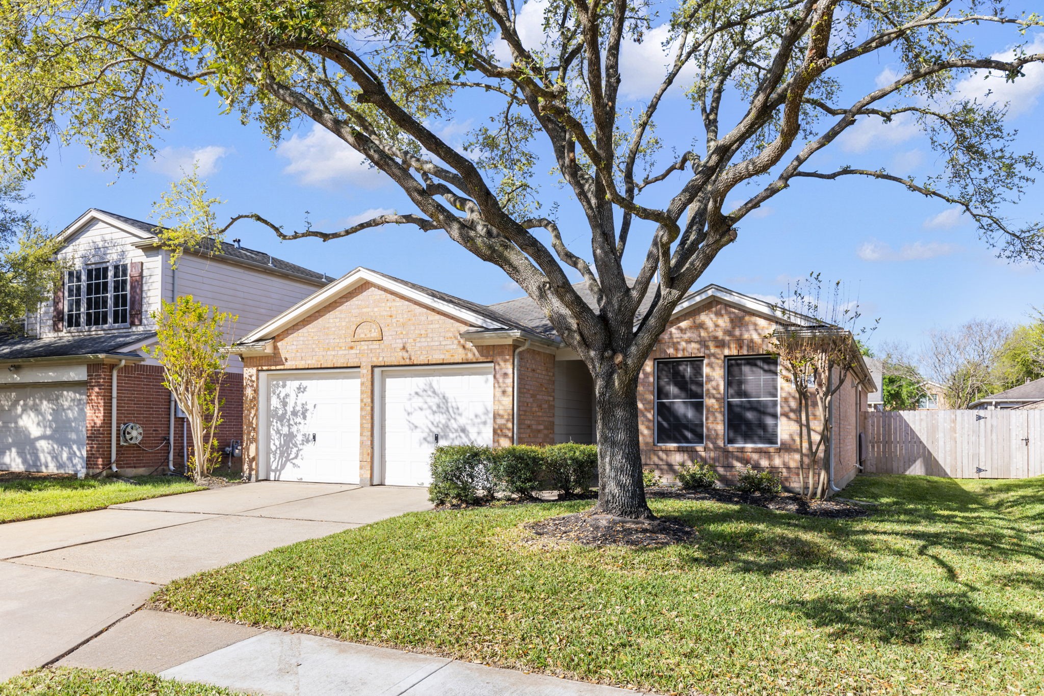 4815 Rustic Field Lane Katy, TX 77449 - Photo 2 of 47 a front view of house with a garden