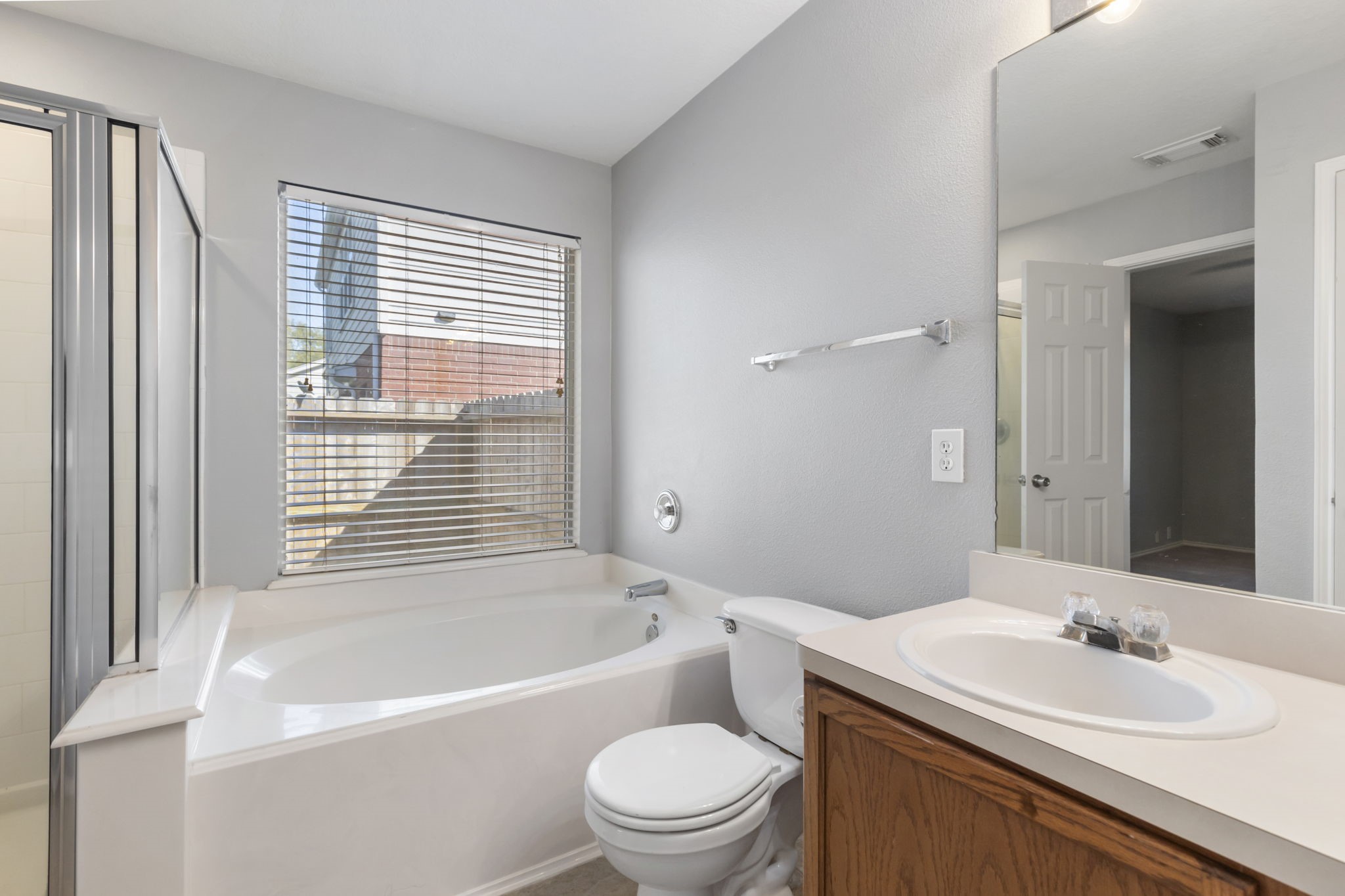 4815 Rustic Field Lane Katy, TX 77449 - Photo 28 of 47 a bathroom with a sink a toilet and shower