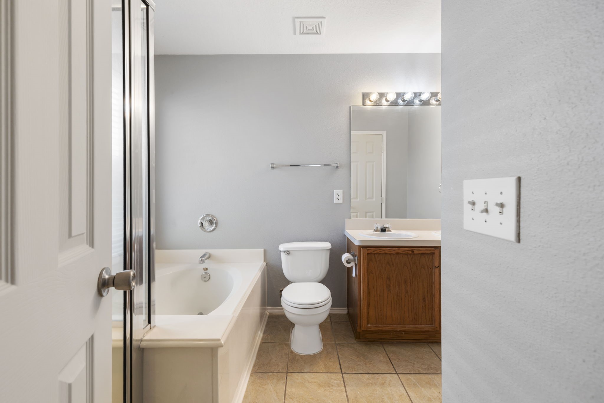 4815 Rustic Field Lane Katy, TX 77449 - Photo 29 of 47 a white toilet sitting next to a bathroom sink