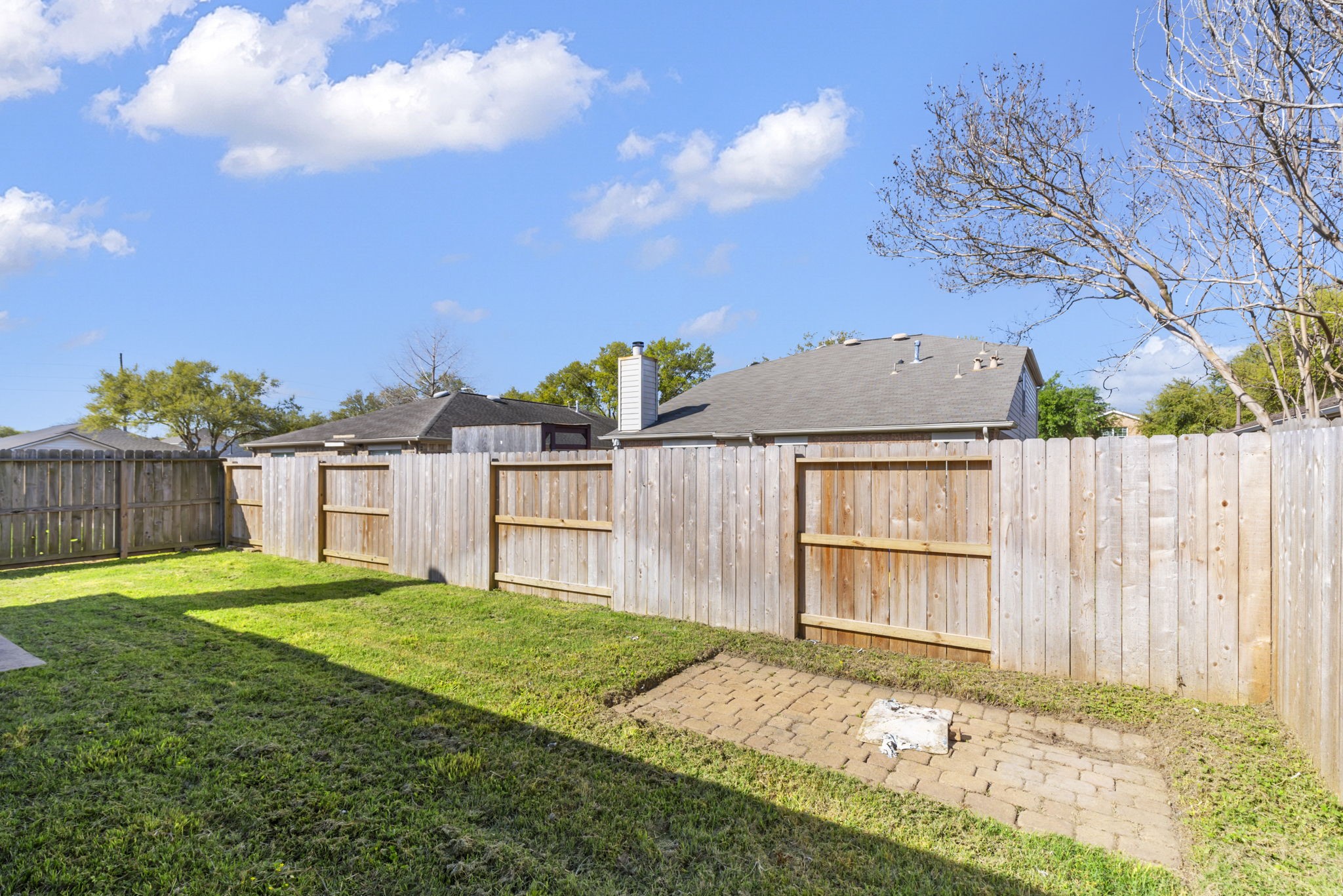4815 Rustic Field Lane Katy, TX 77449 - Photo 46 of 47 a view of a house with a yard and wooden fence