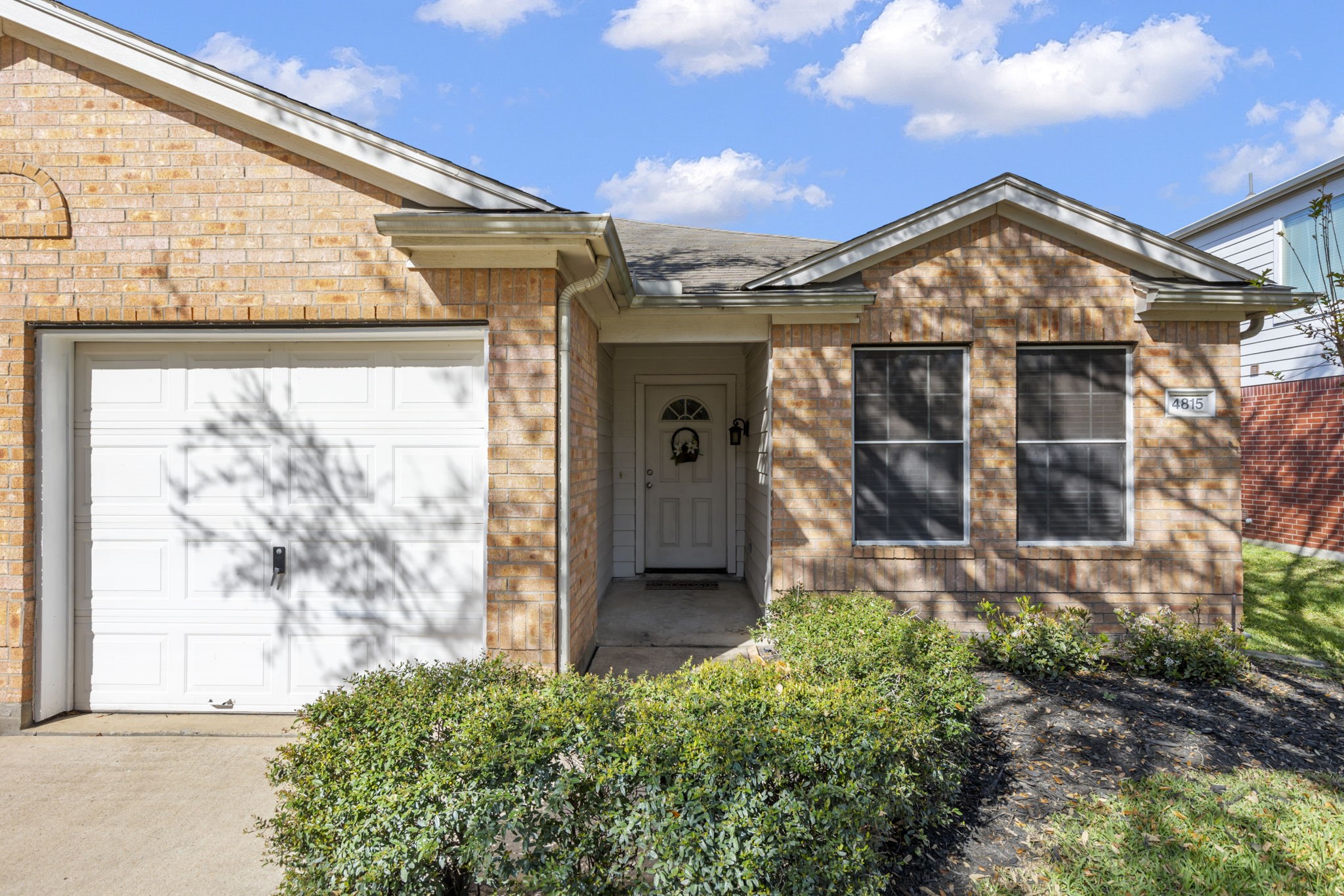 4815 Rustic Field Lane Katy, TX 77449 - Photo 5 of 47 a view of a house with a small yard