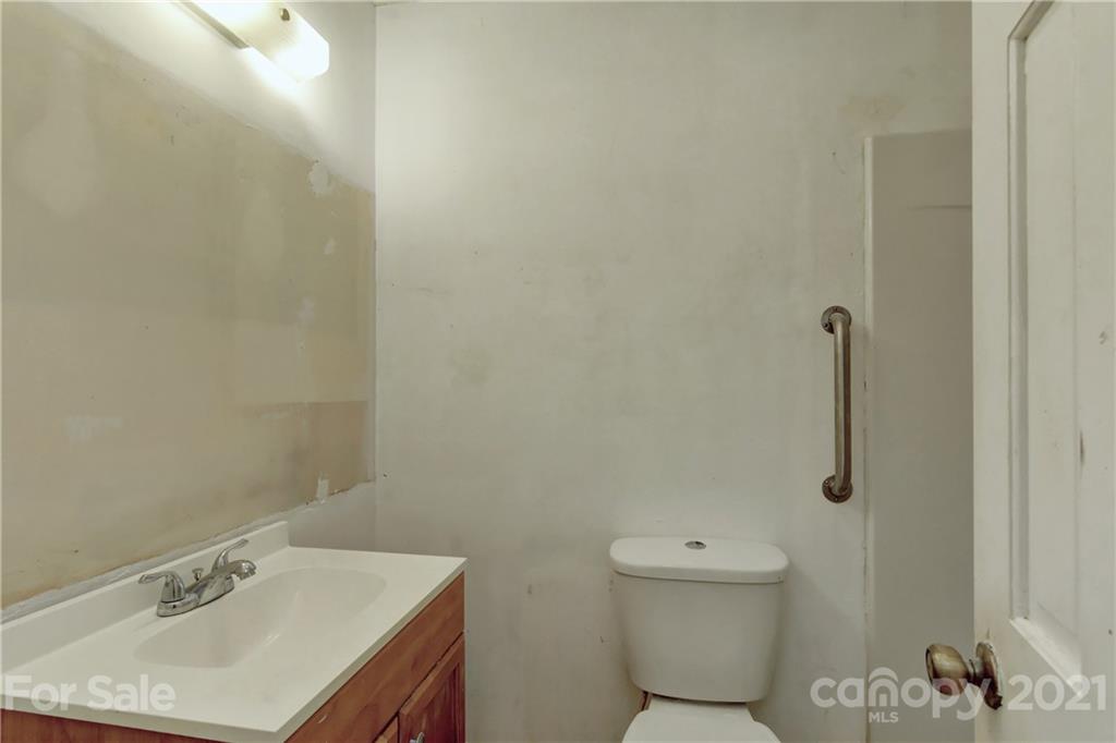 3621 Austin Road Monroe, NC 28112 - Photo 12 of 28 a bathroom with a sink toilet and shower