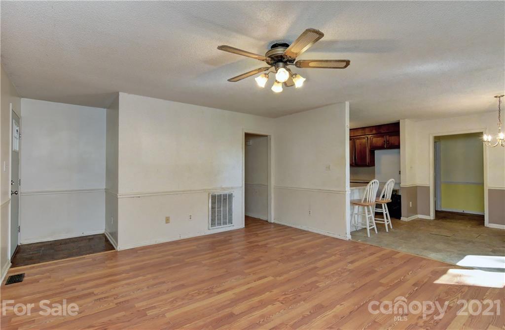3621 Austin Road Monroe, NC 28112 - Photo 19 of 28 a view of empty room with wooden floor