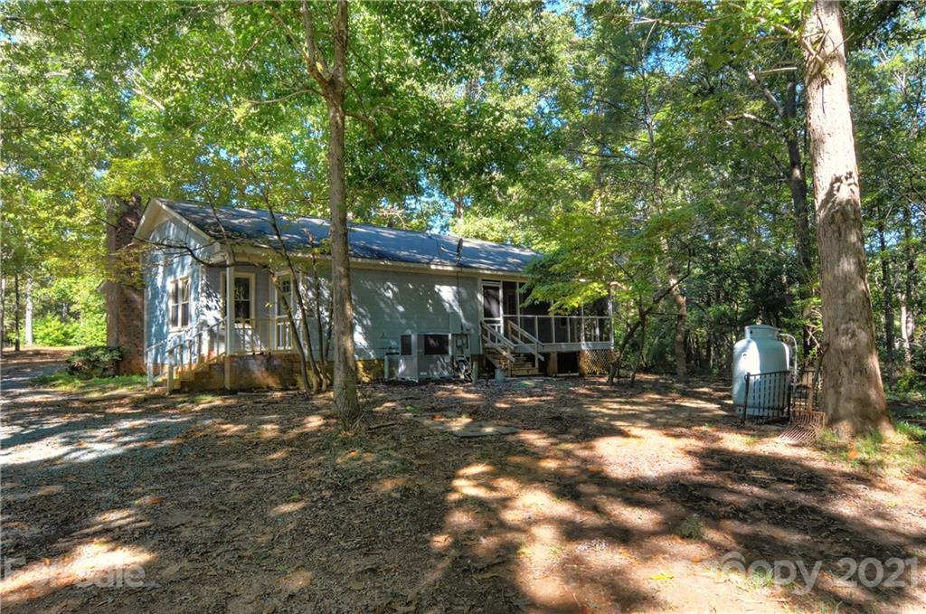 3621 Austin Road Monroe, NC 28112 - Photo 24 of 28 a view of a trees in a backyard