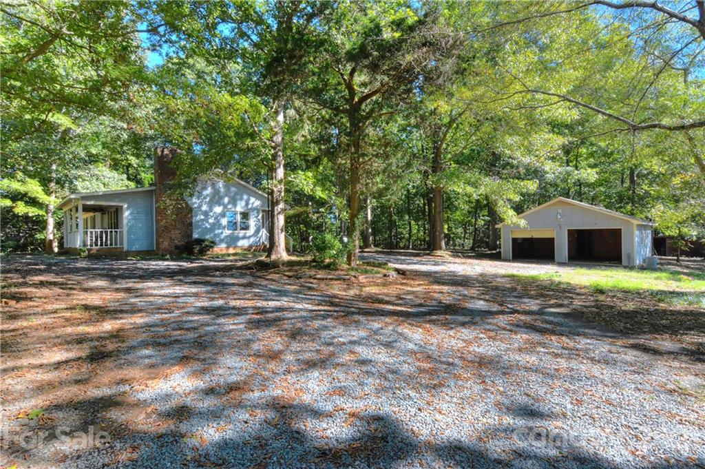 3621 Austin Road Monroe, NC 28112 - Photo 26 of 28 a front view of a house with a yard