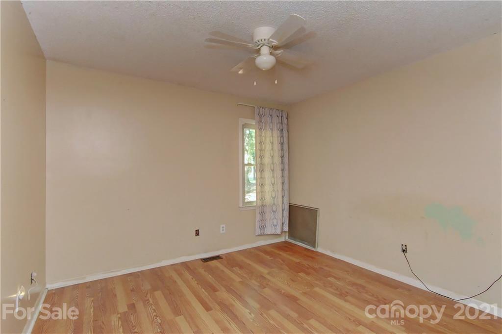 3621 Austin Road Monroe, NC 28112 - Photo 6 of 28 a view of an empty room with a window