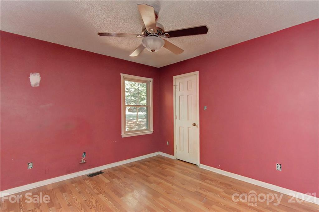 3621 Austin Road Monroe, NC 28112 - Photo 7 of 28 a view of an empty room with a window