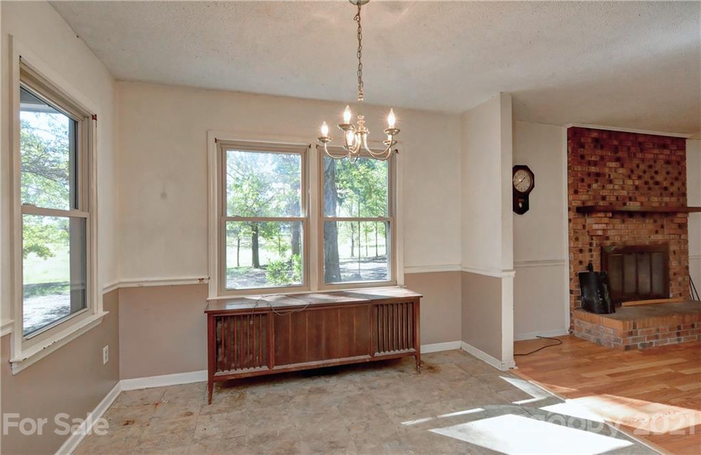 3621 Austin Road Monroe, NC 28112 - Photo 9 of 28 a spacious bedroom with a bed and a window