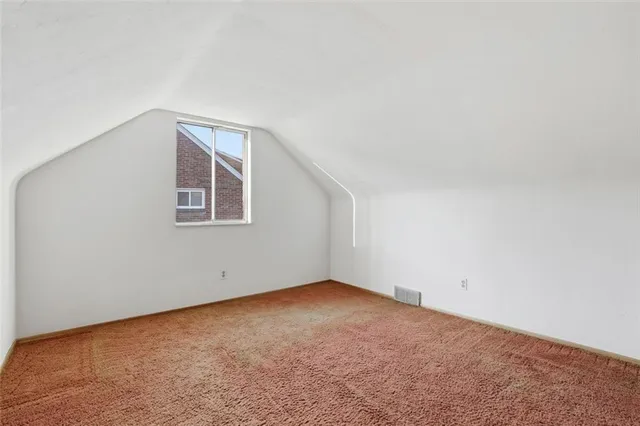 an empty room with a workbench